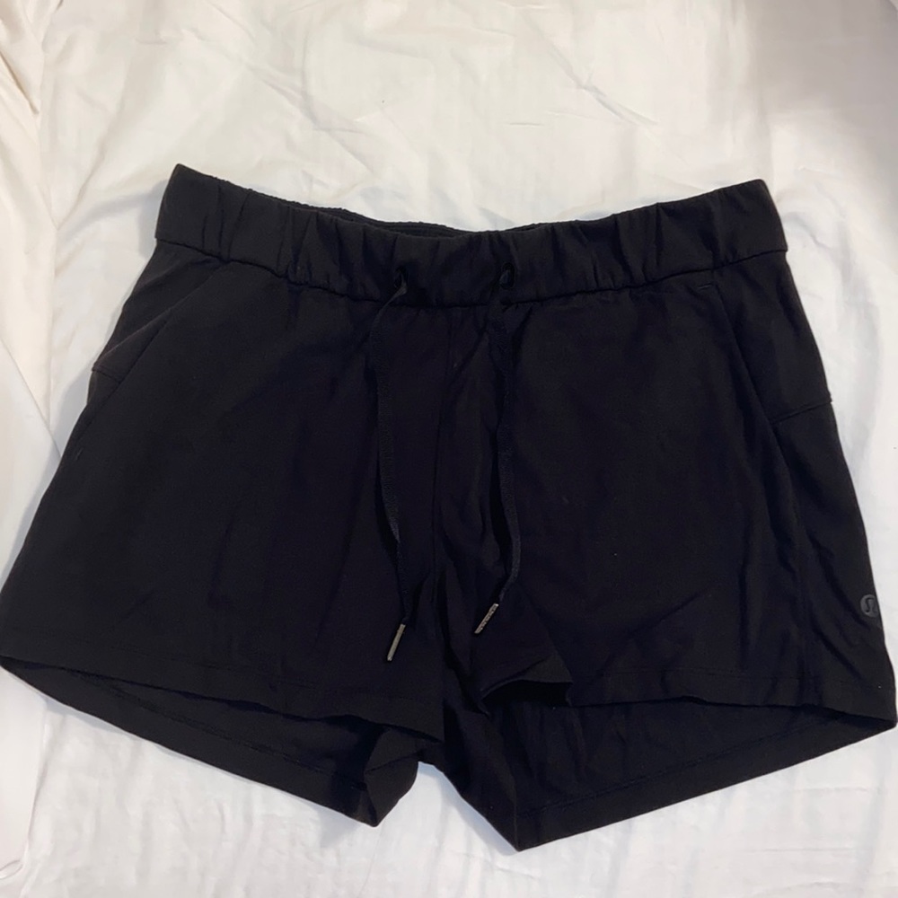 black lululemon draw string shorts 8